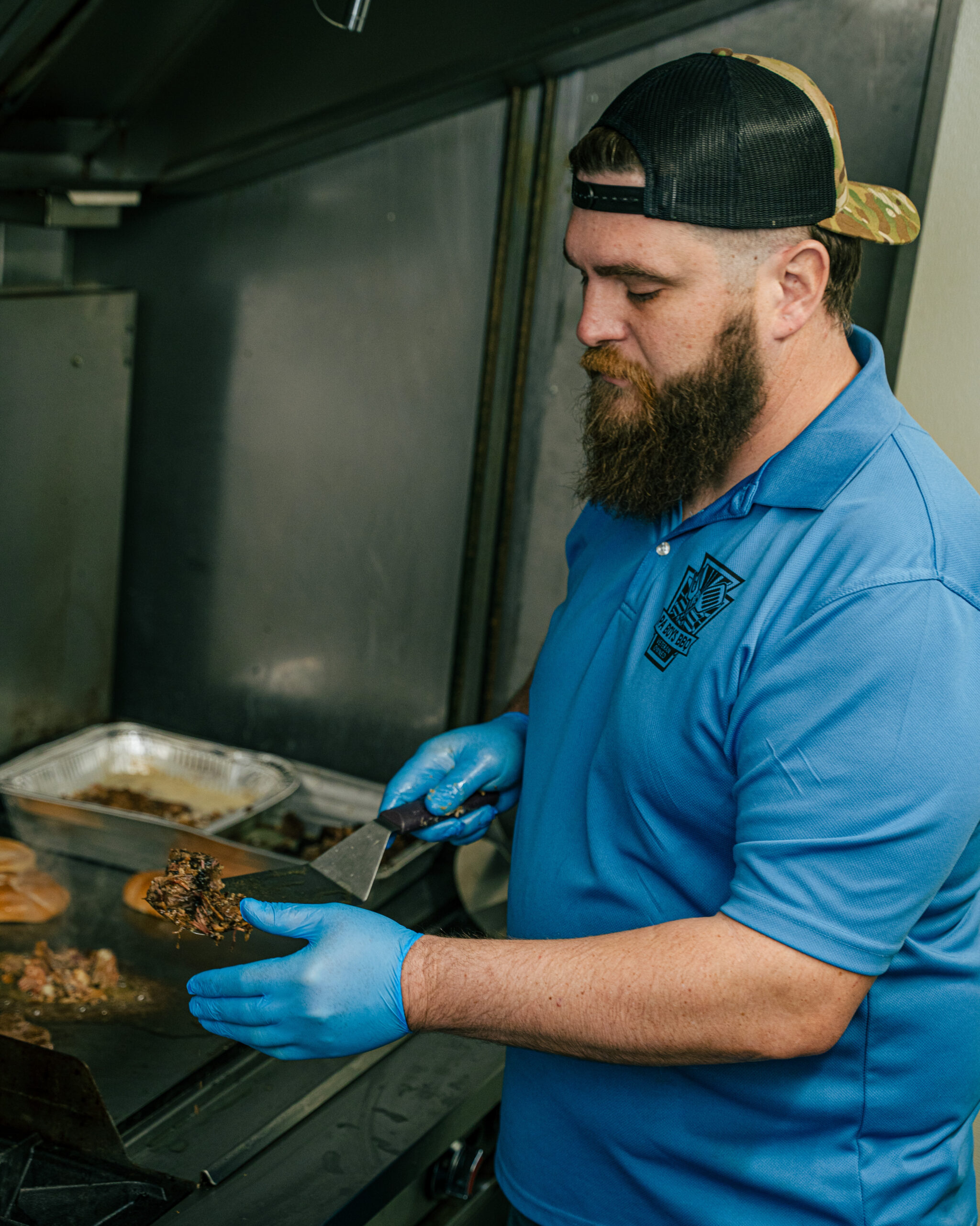 Matt Harper, founder and pitmaster of PA Boys BBQ, standing in front of the food truck